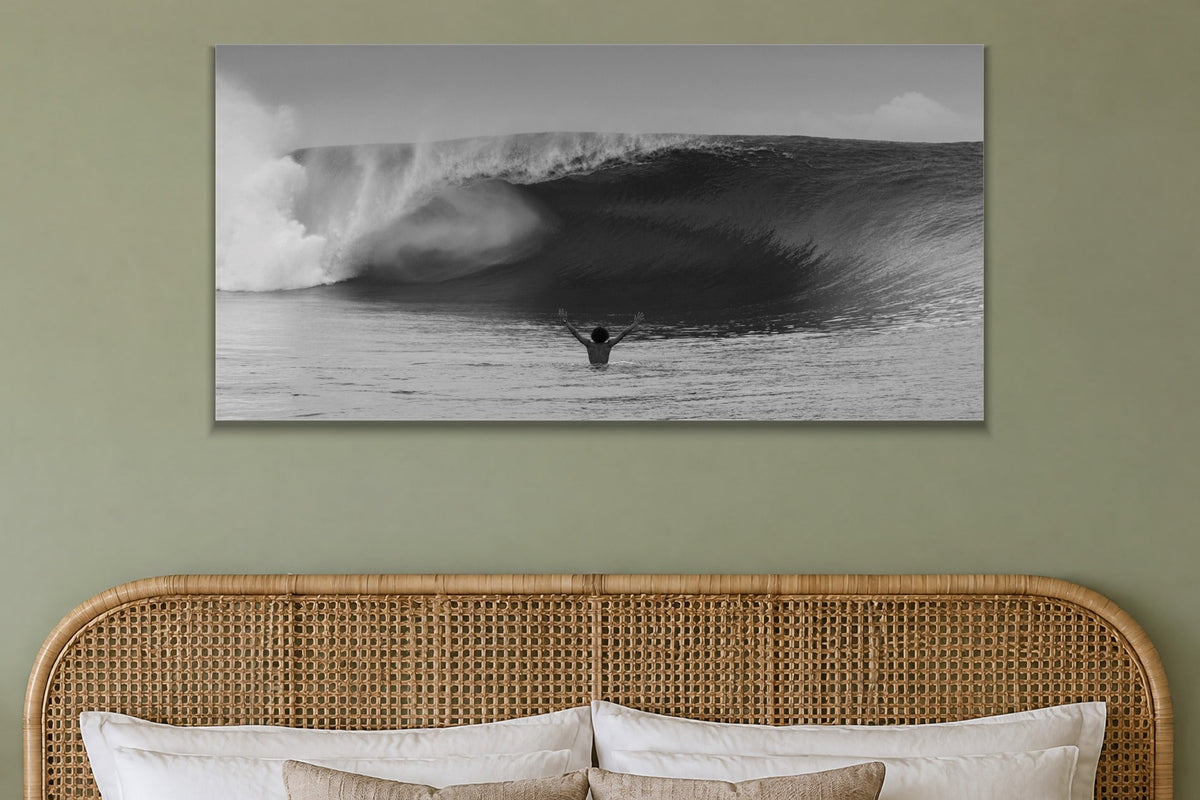 Arms Up metal print hanging above furniture in a living space