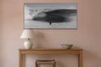 Arms Up metal print hanging above furniture in a living space