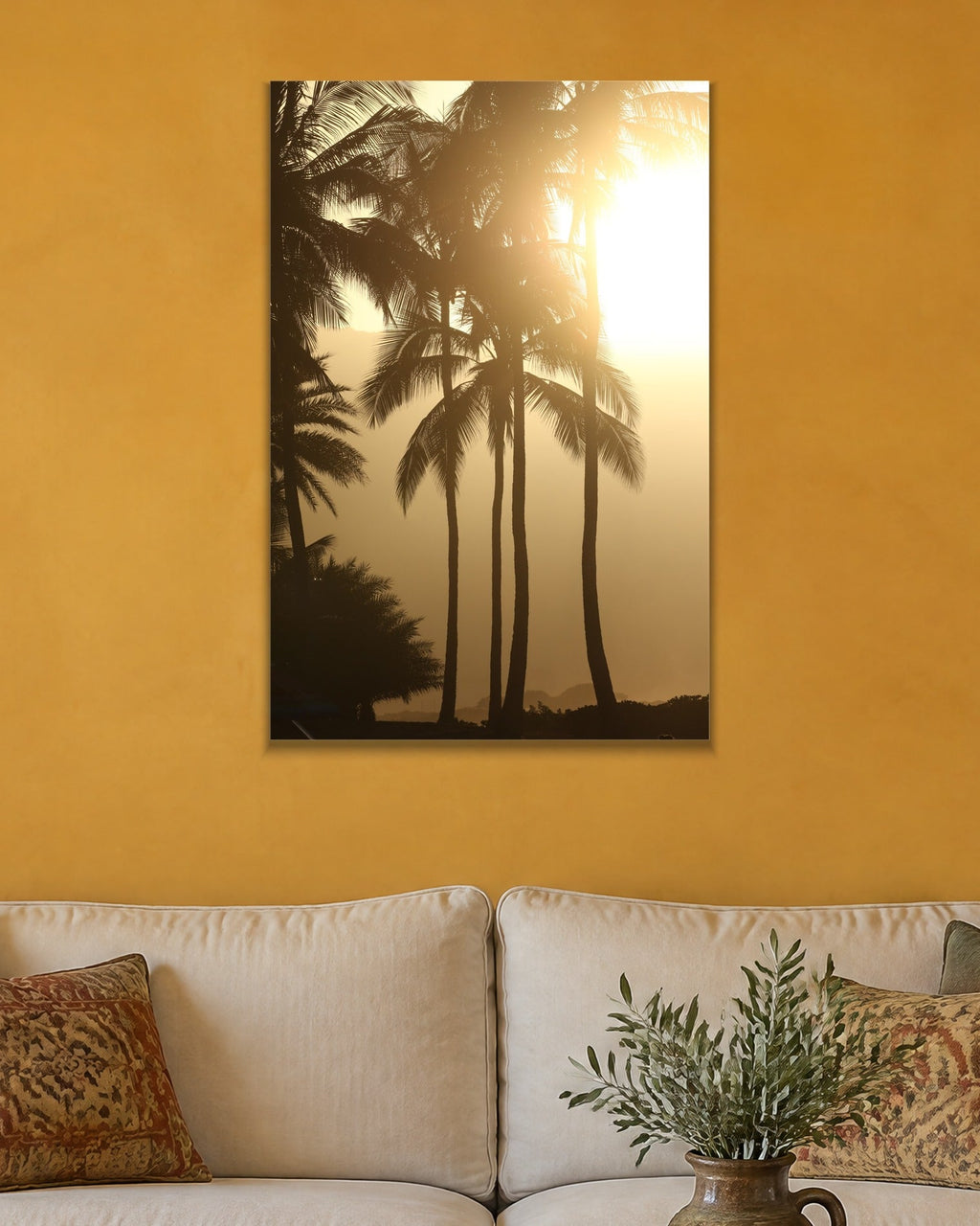 Golden Palms metal print hanging above furniture in a living space
