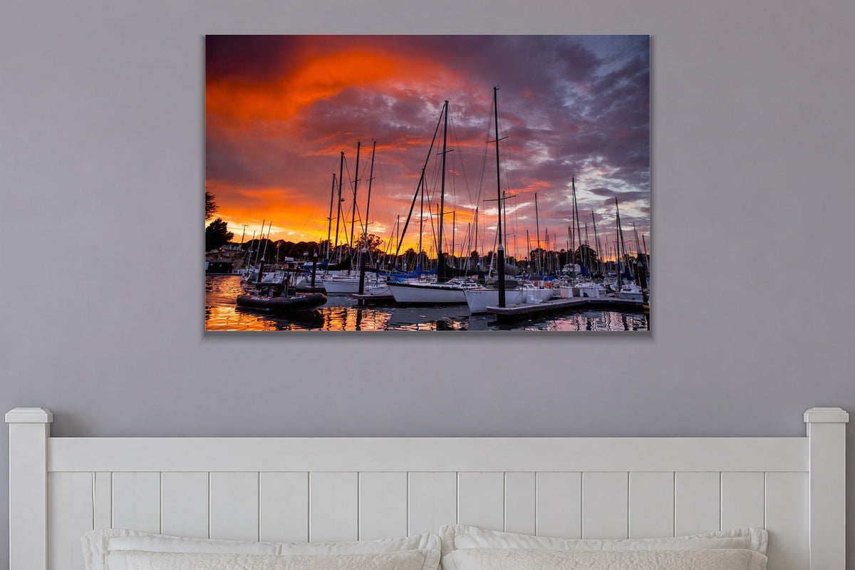 Harbor Light metal print hanging above furniture in a living space