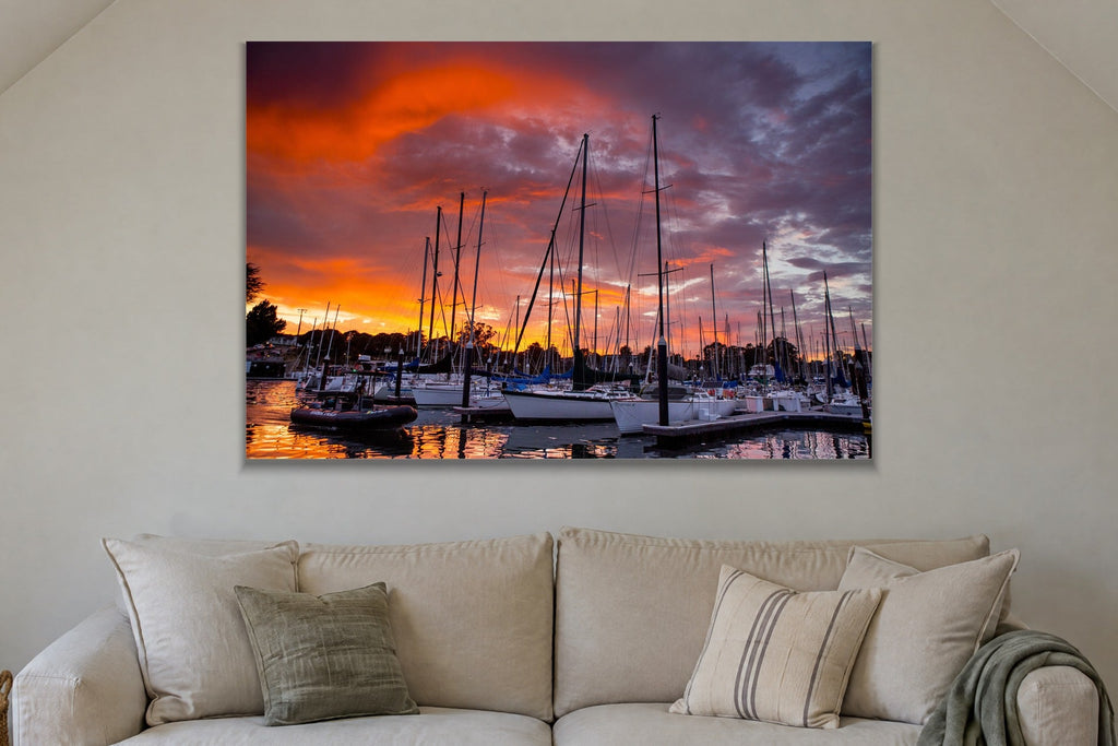 Harbor Light metal print hanging above furniture in a living space