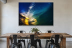 Inside a dark blue wave with golden sunset light at the opening shown large on the wall of a lived-in room