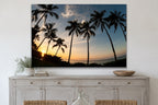 Palms at Dusk metal print hanging above furniture in a living space