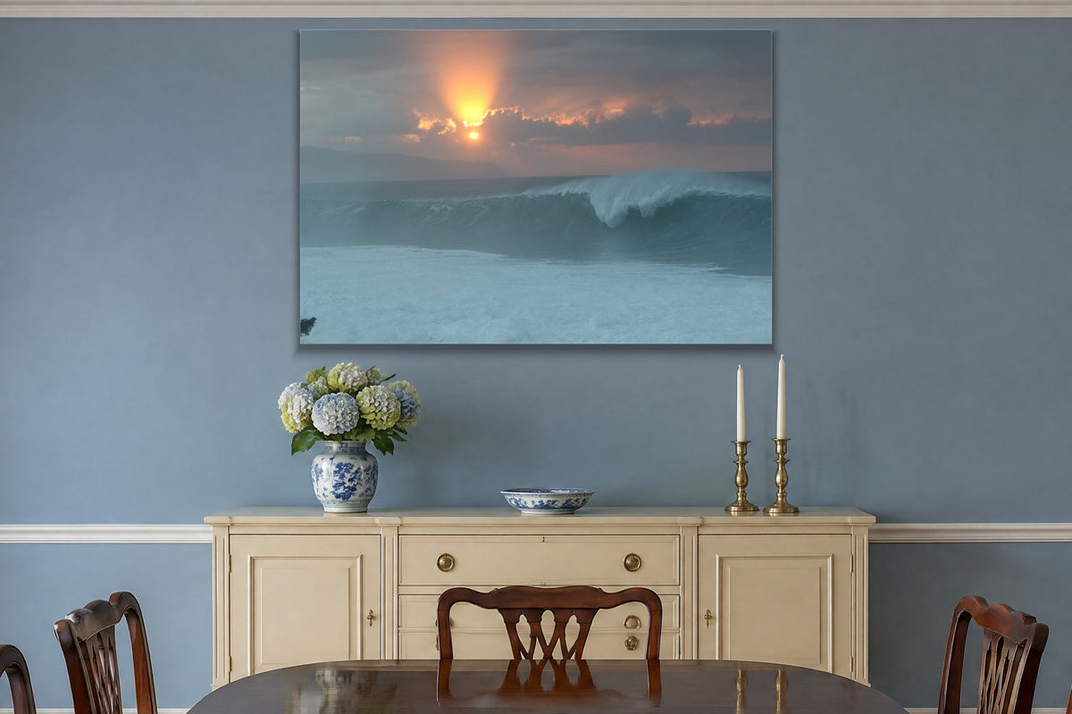 A glowing sun behind clouds above a peeling blue wave shown large on the wall of a lived-in room