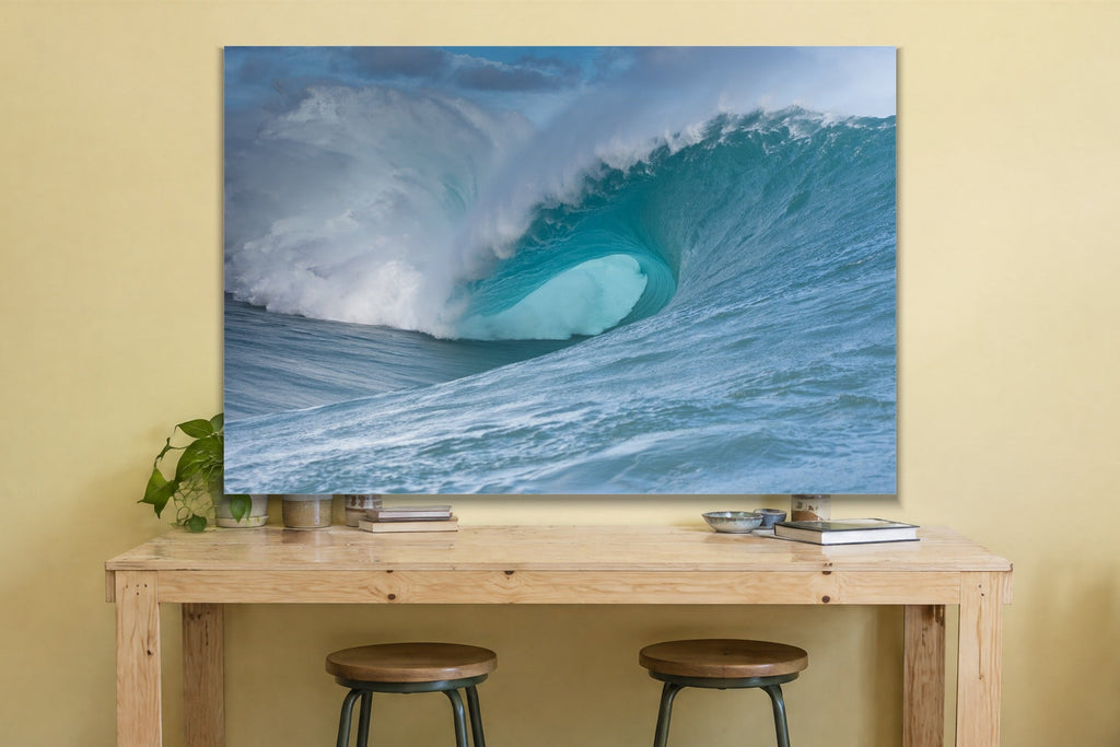 Teal Wave Barrel metal print hanging above furniture in a living space